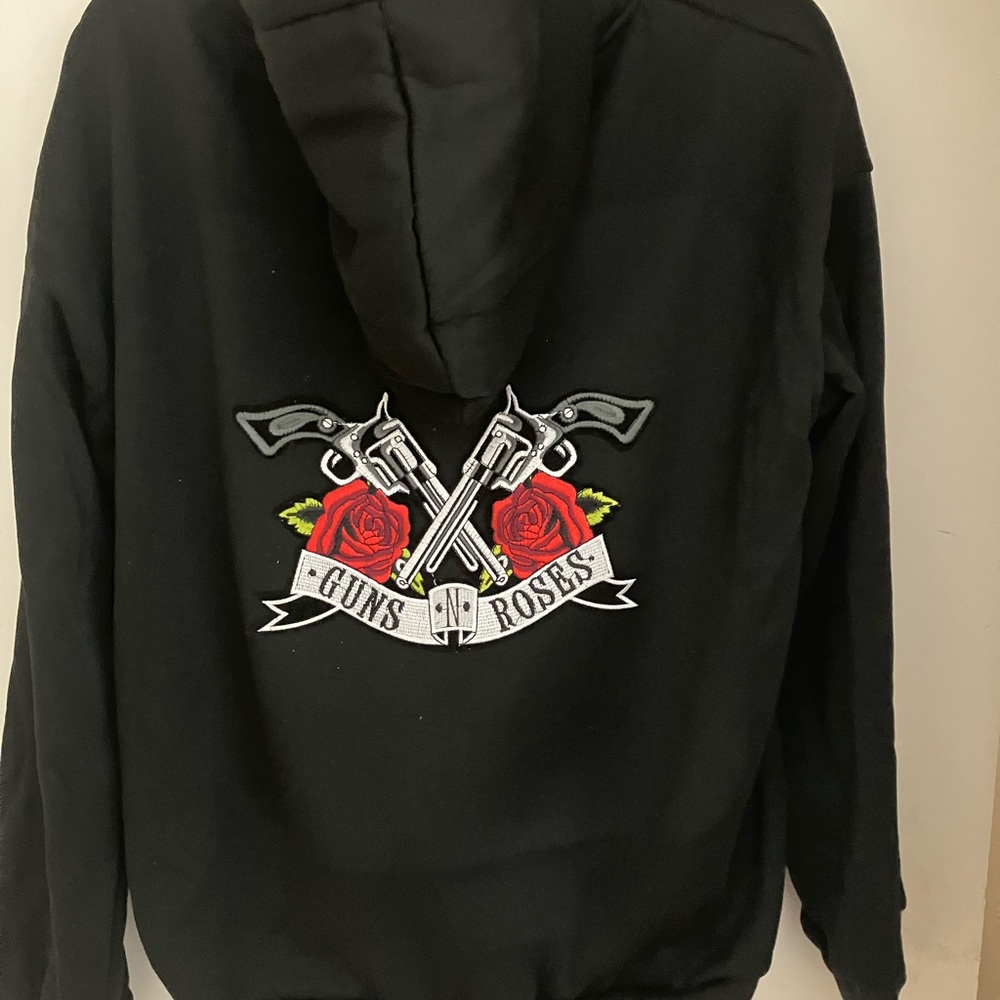 Rock n Roll zip up pocketed front sweat shirt with hood. NWOT. Men or ladies